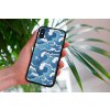 mockup of a woman holding a clear phone case in front of a houseplant 4636 el1 2022 04 19T144336.176