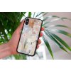 mockup of a woman holding a clear phone case in front of a houseplant 4636 el1 2022 05 04T135627.626