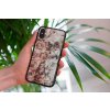 mockup of a woman holding a clear phone case in front of a houseplant 4636 el1 2022 05 18T143706.033