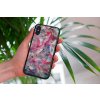 mockup of a woman holding a clear phone case in front of a houseplant 4636 el1 2022 05 23T142507.940
