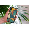 mockup of a woman holding a clear phone case in front of a houseplant 4636 el1 2022 05 24T145540.807
