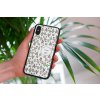 mockup of a woman holding a clear phone case in front of a houseplant 4636 el1 (26)