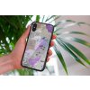 mockup of a woman holding a clear phone case in front of a houseplant 4636 el1 2022 06 02T141505.476