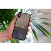 mockup of a woman holding a clear phone case in front of a houseplant 4636 el1 (53)