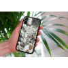 mockup of a woman holding a clear phone case in front of a houseplant 4636 el1