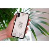 mockup of a woman holding a clear phone case in front of a houseplant 4636 el1 (6)