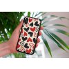 mockup of a woman holding a clear phone case in front of a houseplant 4636 el1 (3)
