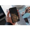 mockup of a man holding a clear phone case 4638 el1 2023 03 30T112348.911