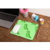mockup of a mousepad lying on a rustic table next to a flower vase 27554 (2)