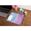 mockup of a mousepad lying on a rustic table next to a flower vase 27554 (5)
