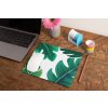 mockup of a mousepad lying on a rustic table next to a flower vase 27554 (7)