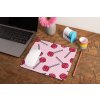 mockup of a mousepad lying on a rustic table next to a flower vase 27554 (8)