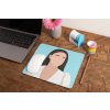 mockup of a mousepad lying on a rustic table next to a flower vase 27554 (10)