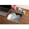 mockup of a mousepad lying on a rustic table next to a flower vase 27554 (11)