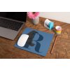 mockup of a mousepad lying on a rustic table next to a flower vase 27554 (38)