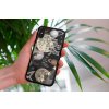 mockup of a woman holding a clear phone case in front of a houseplant 4636 el1 2023 06 20T151432.508