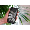mockup of a woman holding a clear phone case in front of a houseplant 4636 el1 2023 06 20T122943.360