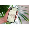 mockup of a woman holding a clear phone case in front of a houseplant 4636 el1 2023 06 20T150506.265