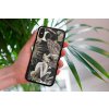 mockup of a woman holding a clear phone case in front of a houseplant 4636 el1 2023 06 20T133951.400
