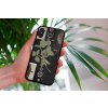 mockup of a woman holding a clear phone case in front of a houseplant 4636 el1 2023 06 20T122538.290