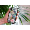 mockup of a woman holding a clear phone case in front of a houseplant 4636 el1 2023 06 20T130829.632