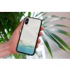 mockup of a woman holding a clear phone case in front of a houseplant 4636 el1 2023 06 20T124904.879
