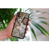 mockup of a woman holding a clear phone case in front of a houseplant 4636 el1 2023 06 20T134116.597