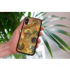 mockup of a woman holding a clear phone case in front of a houseplant 4636 el1 2023 06 20T125343.306