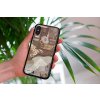 mockup of a woman holding a clear phone case in front of a houseplant 4636 el1 2023 06 20T153346.463