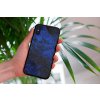 mockup of a woman holding a clear phone case in front of a houseplant 4636 el1 2023 06 20T120623.301
