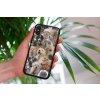 mockup of a woman holding a clear phone case in front of a houseplant 4636 el1 2023 06 20T143435.617