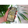 mockup of a woman holding a clear phone case in front of a houseplant 4636 el1 2023 06 20T160003.740