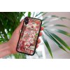 mockup of a woman holding a clear phone case in front of a houseplant 4636 el1 2023 06 20T152932.356