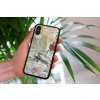 mockup of a woman holding a clear phone case in front of a houseplant 4636 el1 2023 06 20T154842.287