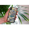 mockup of a woman holding a clear phone case in front of a houseplant 4636 el1 2023 06 20T153622.877