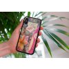 mockup of a woman holding a clear phone case in front of a houseplant 4636 el1 2023 06 20T142930.599
