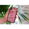 mockup of a woman holding a clear phone case in front of a houseplant 4636 el1 2023 06 20T142642.495