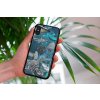 mockup of a woman holding a clear phone case in front of a houseplant 4636 el1 2023 06 20T145948.483