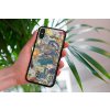 mockup of a woman holding a clear phone case in front of a houseplant 4636 el1 2023 06 20T153622.877