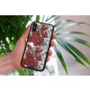 mockup of a woman holding a clear phone case in front of a houseplant 4636 el1 2023 06 20T144155.845