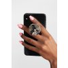 mockup of a hand holding a phone with a phone grip on a plain background 28169