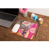 mockup of a mousepad lying on a rustic table next to a flower vase 27554 (35)