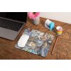 mockup of a mousepad lying on a rustic table next to a flower vase 27554 (25)