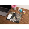 mockup of a mousepad lying on a rustic table next to a flower vase 27554 (49)