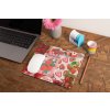 mockup of a mousepad lying on a rustic table next to a flower vase 27554 (13)