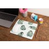 mockup of a mousepad lying on a rustic table next to a flower vase 27554 (4)