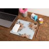 mockup of a mousepad lying on a rustic table next to a flower vase 27554 (58)