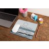 mockup of a mousepad lying on a rustic table next to a flower vase 27554 (14)