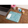 mockup of a mousepad lying on a rustic table next to a flower vase 27554 (23)