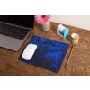 mockup of a mousepad lying on a rustic table next to a flower vase 27554 (90)